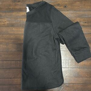 Like new! Black sweater pullover with mesh top.